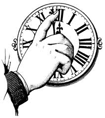 Hand Adjusting Time on an Antique Clock